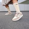 Dunk Low Malt Gold Mini Swoosh (Women's)