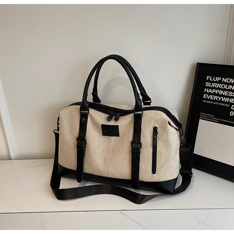 

2025 spring new large-capacity short-distance portable travel bag light business messenger bag casual versatile sports bag чорний