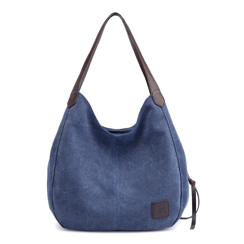 

Trendy Korean Style Multi-Compartment Canvas Women s Shoulder Bag: Versatile, Simple, and Large темно-синього кольору