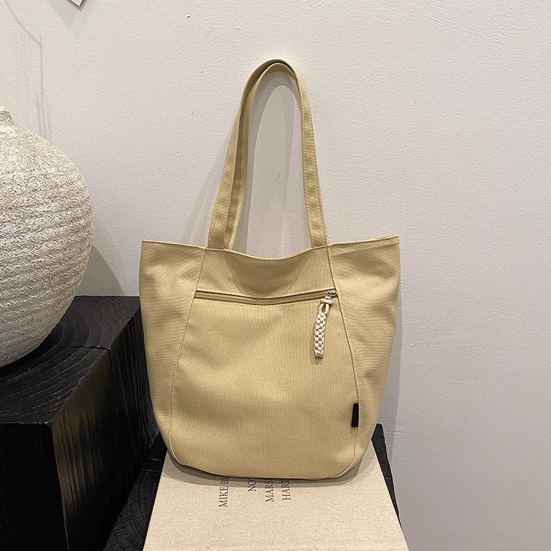 Customized bags for women 2025 new large-capacity tote bags, commuter tote bags, student women's shoulder bags.