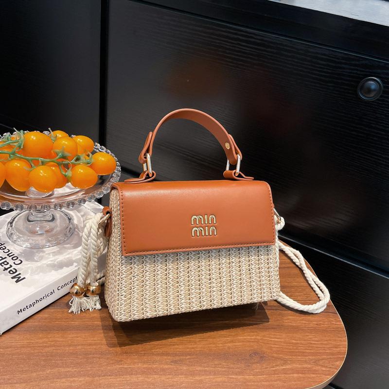 Niche design bag women's new fashion versatile shoulder messenger bag high-end straw handbag