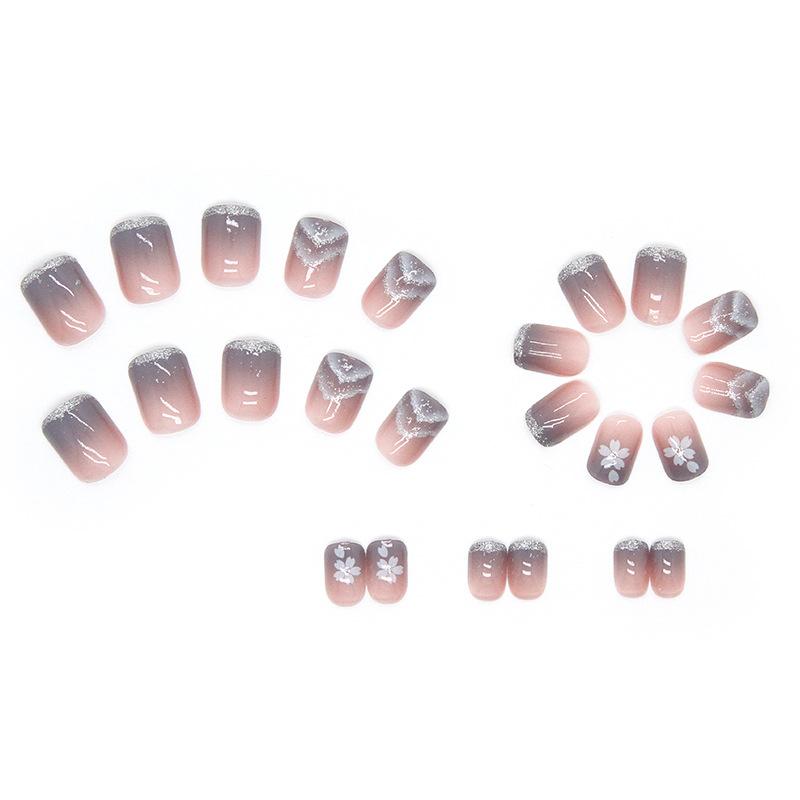 Trage kurze und dünne Nagelstücke, neue Nagelstücke, blaues Farbverlauf-Smudging glänzende Stücke, Nagelstücke