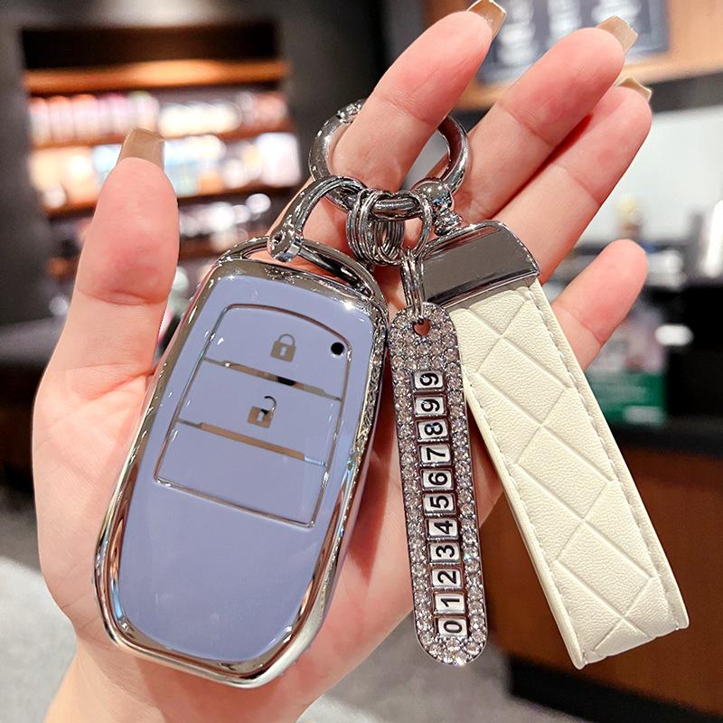Applicable à la housse de clé Toyota Fenglanda Corolla Ruifang Lingfang 2023 Wesa Kuluze bz3 boucle de sac de voiture