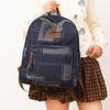 Ein gewaschener Retro-Patchwork-Denim-Rucksack für Mittelschüler