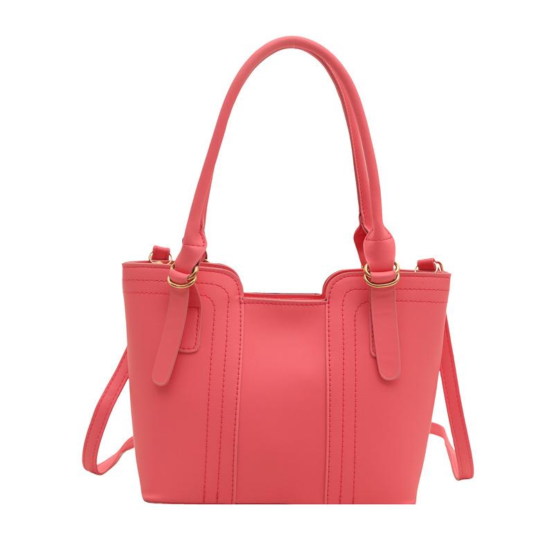 

Korean version of fashion handbag bag women s 2025 new commuter bucket bag trend sense splicing casual shoulder messenger bag розовый