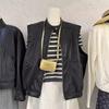 New Arrival: Retro Korean Style Black Leather Vest - Versatile and Slimming Sleeveless Outerwear for Spring