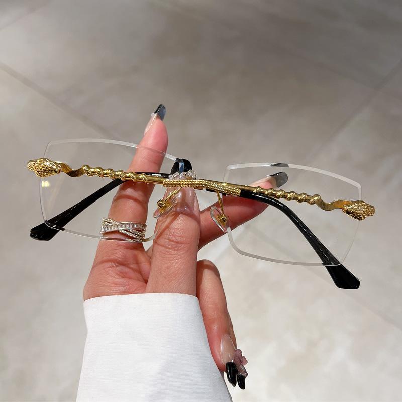 Luxury Vintage Rimless Sunglasses Women Fashion Trendy Snake Frame Gradient UV400 Sun Glasses For Men And Women