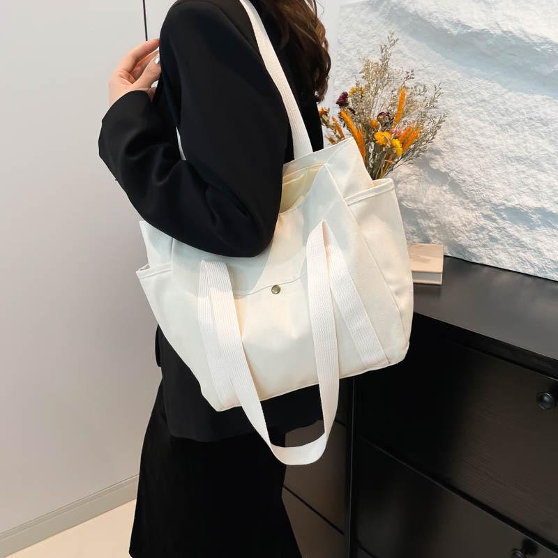 Spacious Canvas Tote Bag For Work And Leisure Stylish Commuter Must-have Accessory