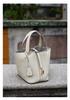 Genuine Leather Women's Bucket Bag - Cowhide Handbag, High-End Women's Tote and Mommy Bag, Vegetable Basket Style 2026 New Release.
