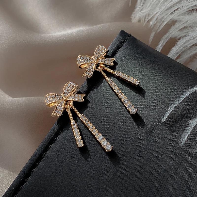 Korean Dongdaemun French Bow Diamond Tassel Dangle Earrings - Elegant Women's Influencer Ear Jewelry, High-End Stud Design.