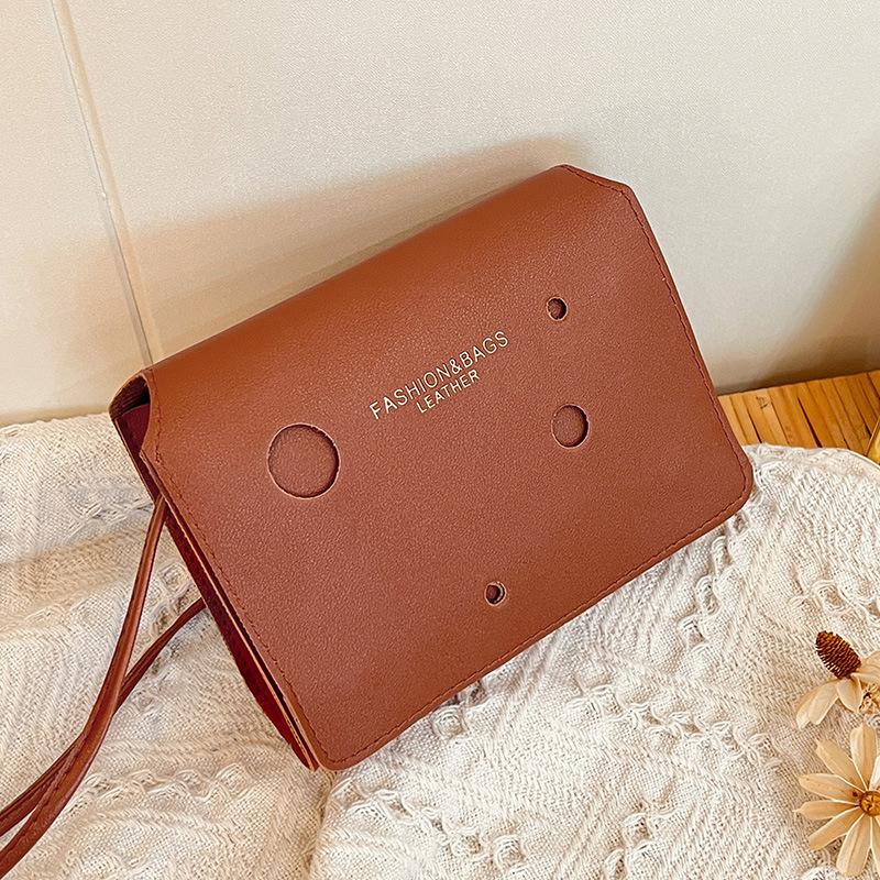 

Guangzhou small bag hollow small square bag new fashion women s crossbody printed letter shoulder bag коричневый