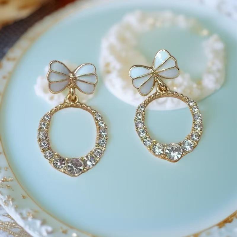 Elegant Rhinestone Bow Earrings for Women - Hollow, Round Design