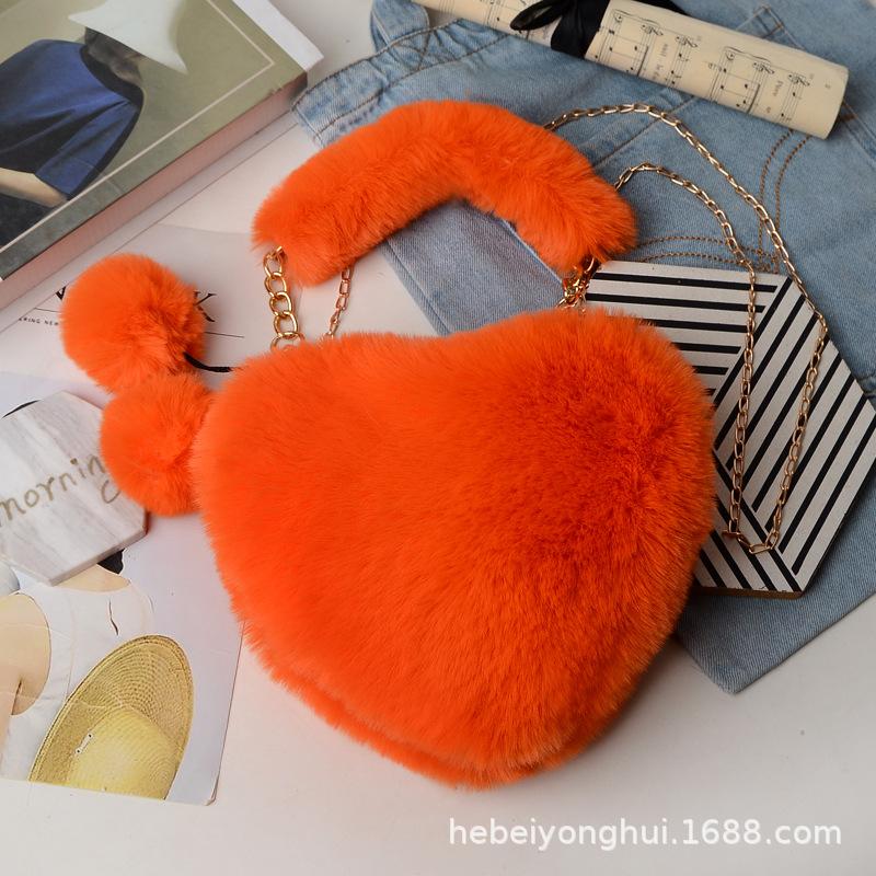 Herbst und Winter neue tragbare Liebeswolle Tasche Mode Kette Umhängetasche Plüschtasche Herztasche rote Fell Strohtasche Handtrage