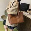 New woven bag women's fashion retro high-end sense large capacity texture commuter hollow shoulder bag tote bag