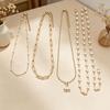 European & American Fashion Layered Pearl Cross Necklace - Luxurious, Versatile, Four-Layer Design
