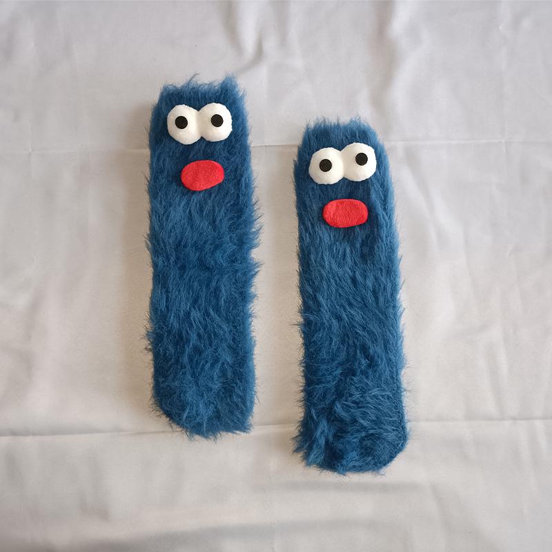 A pair of ugly cute funny socks women's medium tube socks autumn and winter floor sleeping socks coral fleece home hair fluffy c