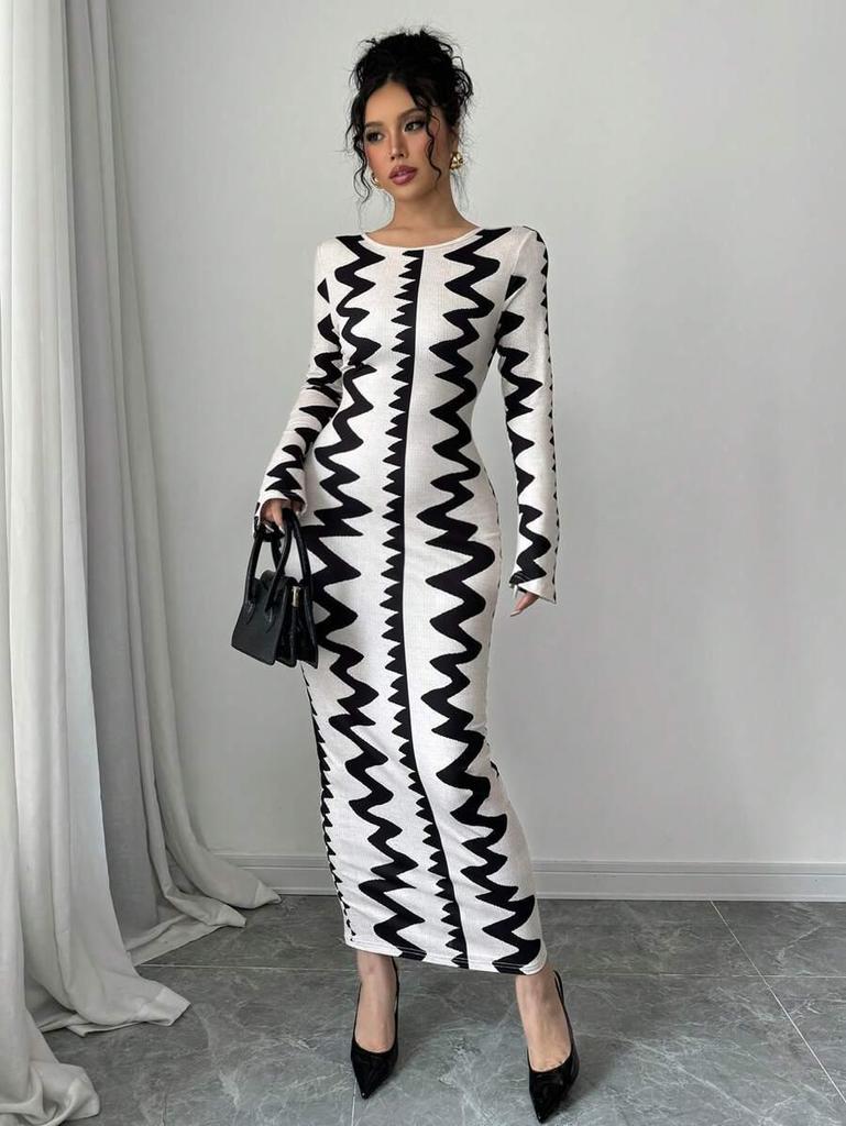 Evropské a americké podzim/zima 2025 přiléhavé šaty s černobílým potiskem, kulatým výstřihem a dlouhými rukávy