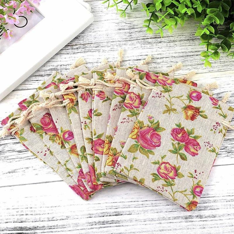 

WTEMPO Linen Rose Print Drawstring Gift Bags Elegant Jewelry Packaging for Weddings, Birthdays & More 50pcs*10*14cm розовый