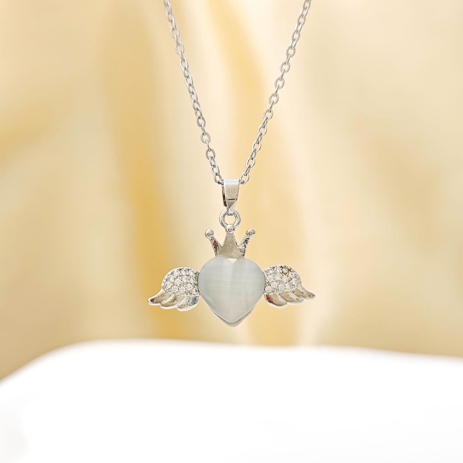 Heart-Shaped Cat s Eye Titanium Steel Necklace: Simple Wing Collarbone Chain with Crown Pendant