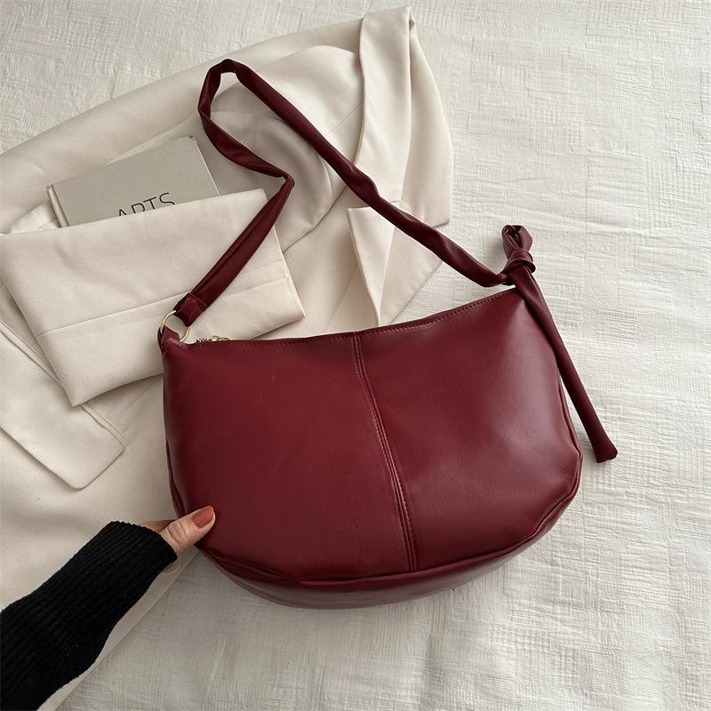 

2025 niche Korean version of soft leather large-capacity fashion casual bag, shoulder messenger bag, popular texture tote bag this year червоний