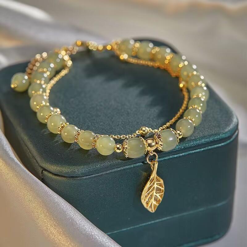 

Qixi Festival Valentine s Day high-end gift bracelet gold branches jade leaves light luxury niche bracelet high-end girlfriend