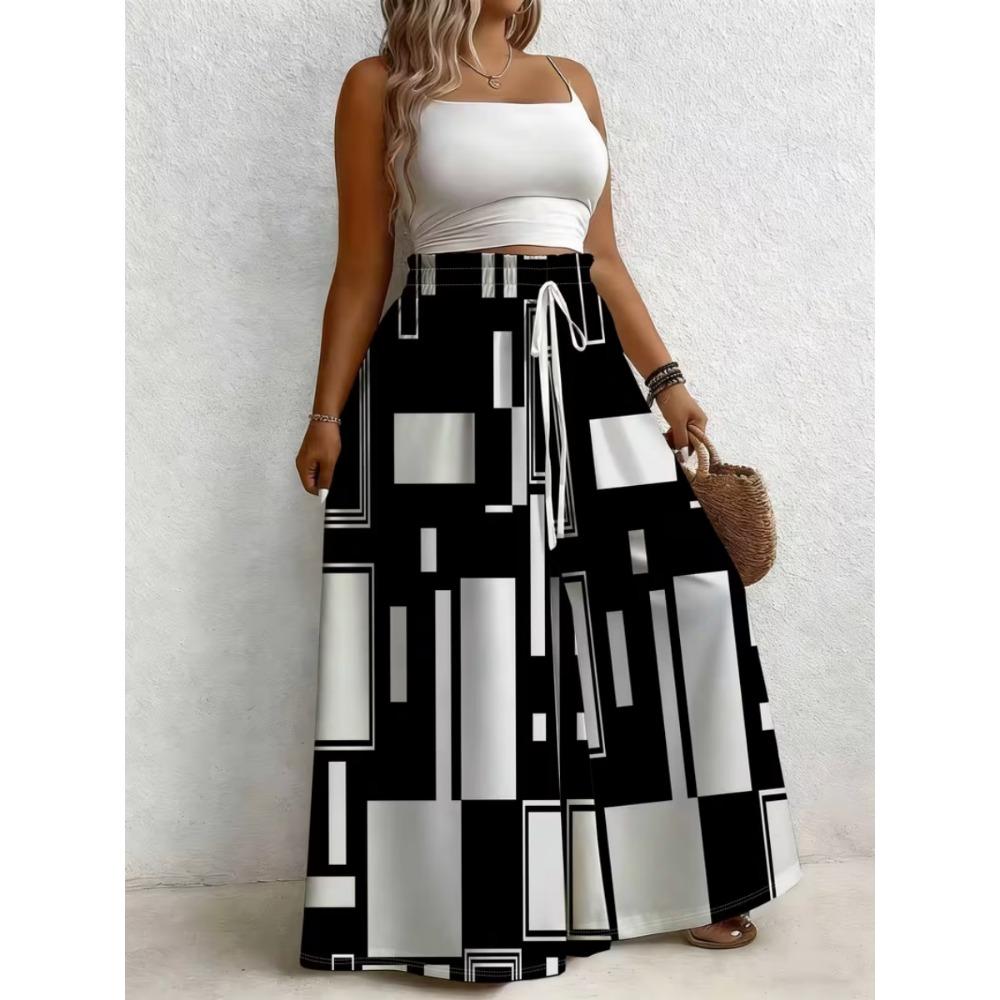 Large size women's printed loose wide leg pants, elegant with pockets, suitable for vacation and daily wear