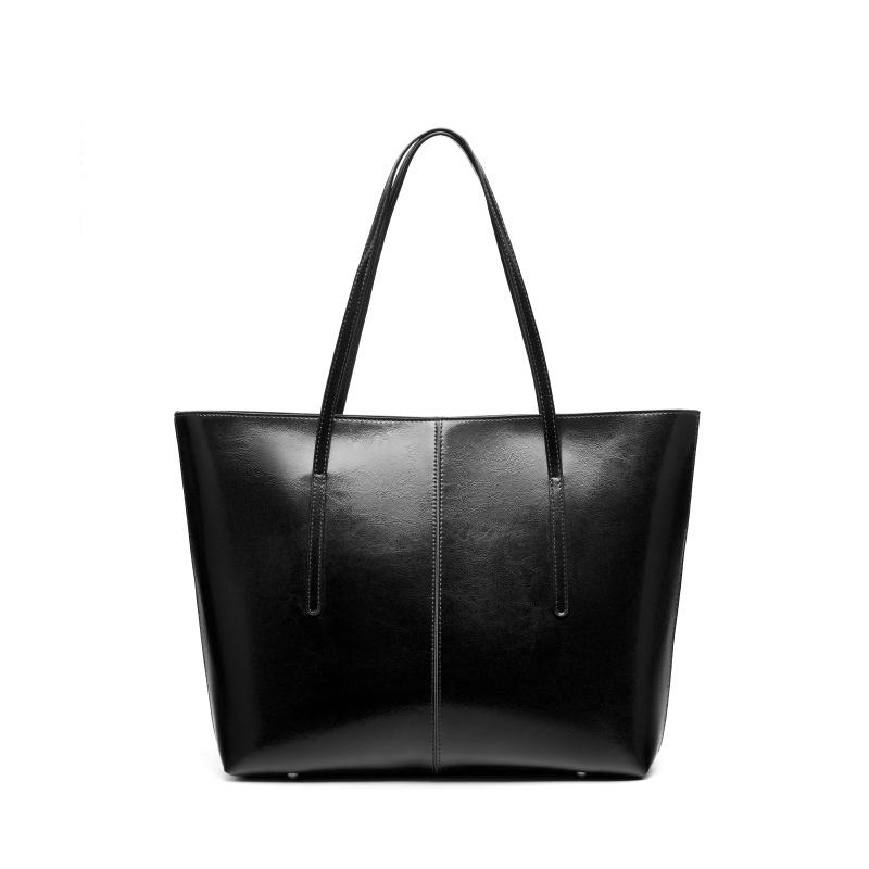 Large capacity leather tote bag, new versatile portable underarm bag, women's bag, niche shoulder bag.