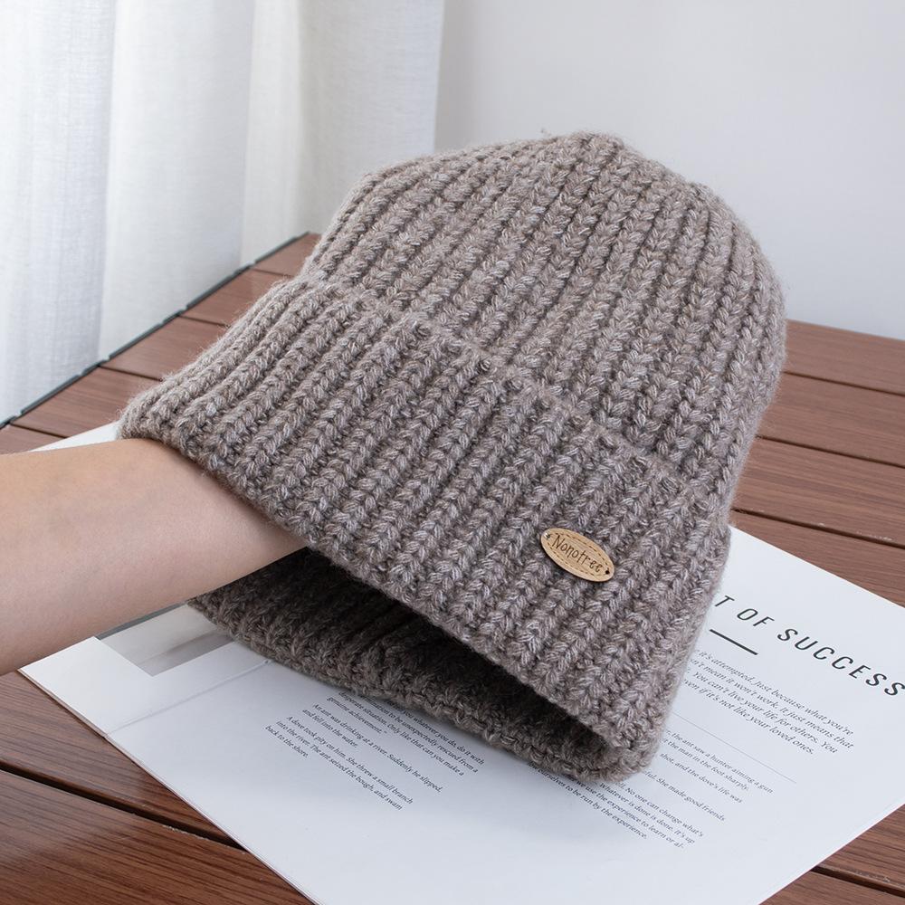 Exquisite small standard simple solid color autumn and winter warm wool knitted hat versatile daily warm face small knitted hat