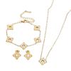 Elegant Titanium Steel Clover Jewelry Set - Necklace, Bracelet, and Earrings in Four-Leaf Design with Micro-Inlaid Details for Women.