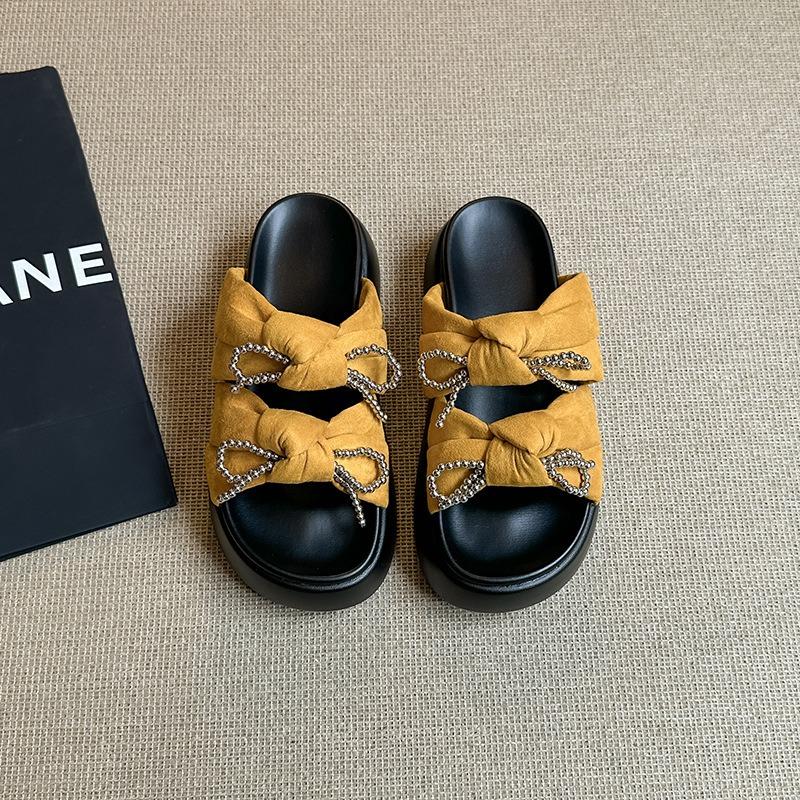 Sweet slippers women's outer wear summer new fashion thick-bottomed beach one-word bow flat-bottomed sandals
