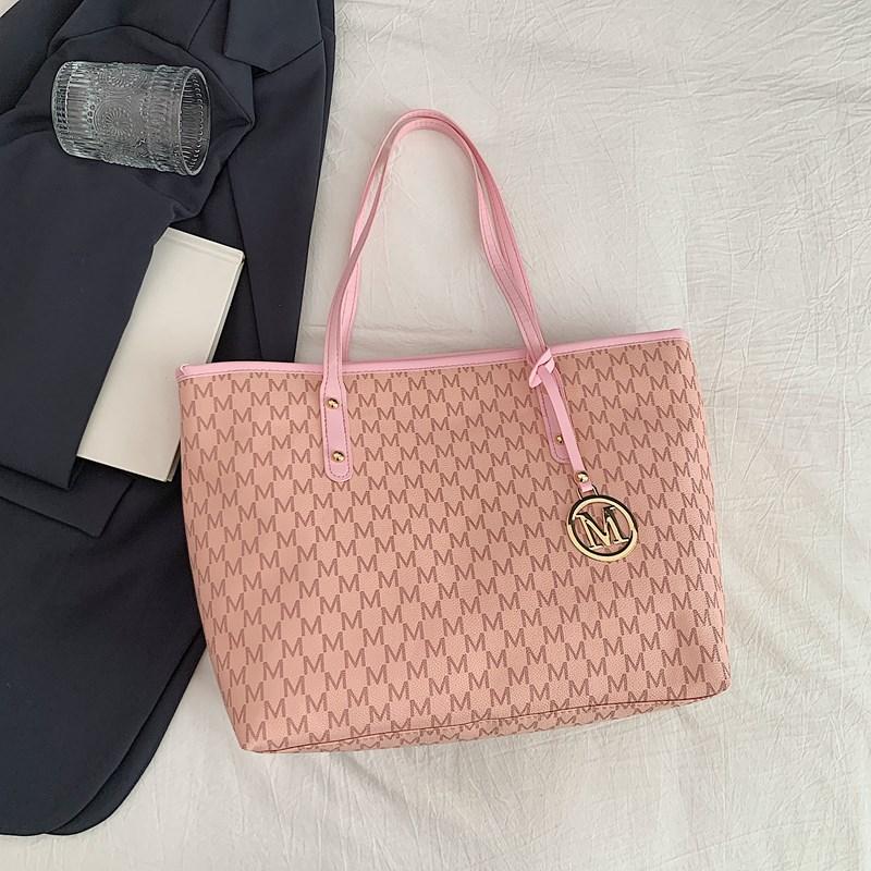 

Премиальное ощущение иностранного стиля, универсальная женская сумка-тоут, новая модная сумка на плечо лето 2025, женская сумка большой вместимости розовый