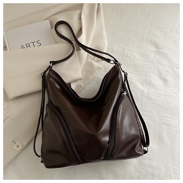 

Женский мягкий кожаный рюкзак: Вместительная, Модная, Универсальная Сумка-тоут через плечо - Новый стиль 2025 года, Идеальна для повседневных поездок на работу. кофейный