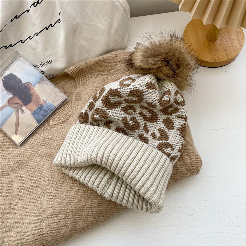 Hat women's new autumn and winter versatile Korean version leopard print hairball wool hat fashionable warm crimping knitted pullover hat tide