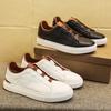 Erste Schicht Rindsleder kleine weiße Schuhe Herrenschuhe Ein-Pedal Leder-Board-Schuhe High-End Kreuzgurt lässige Lederschuhe