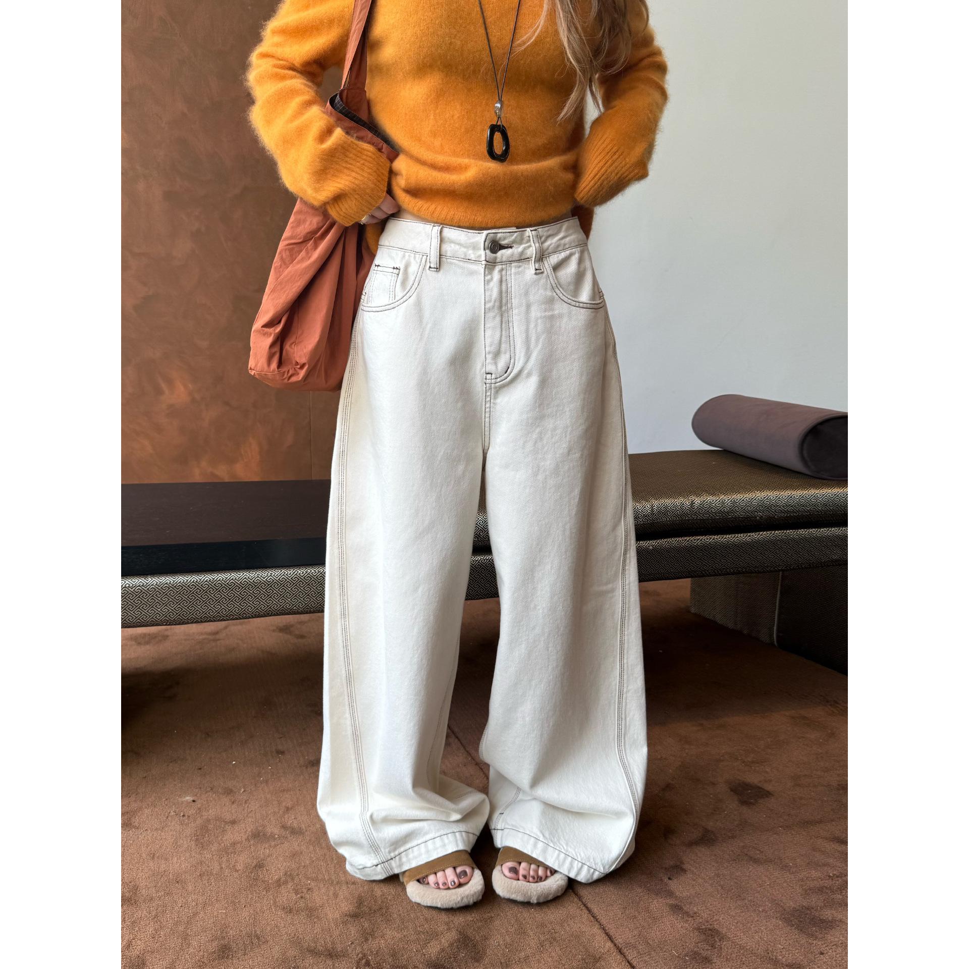 

Women s Color-Block Curved Leg Denim Jeans with Oversized Fit and Exposed Stitching - Style 10538. 27
