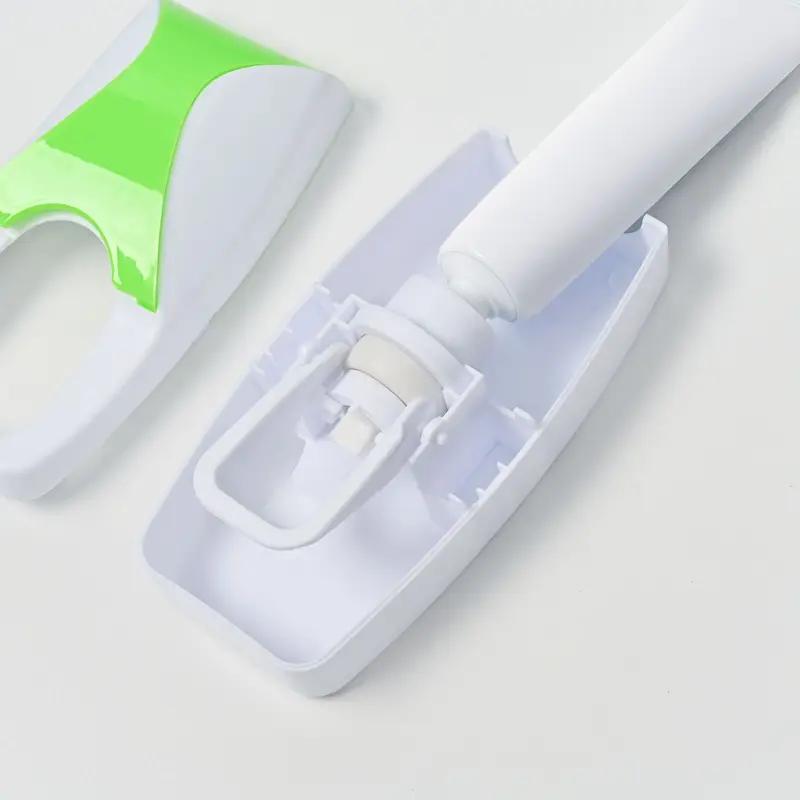 A Wall Mounted Toothbrush Holder with an Automatic Toothpaste Dispenser and a Bathroom Toothpaste Squeezer
