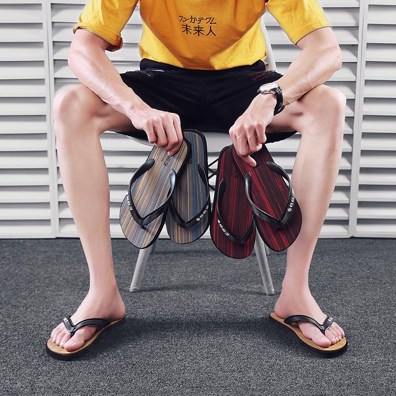 New flip-flops men's trendy outdoor slippers men's summer fashion outer wear men's foot pinching personality Vietnamese sandals beach shoes