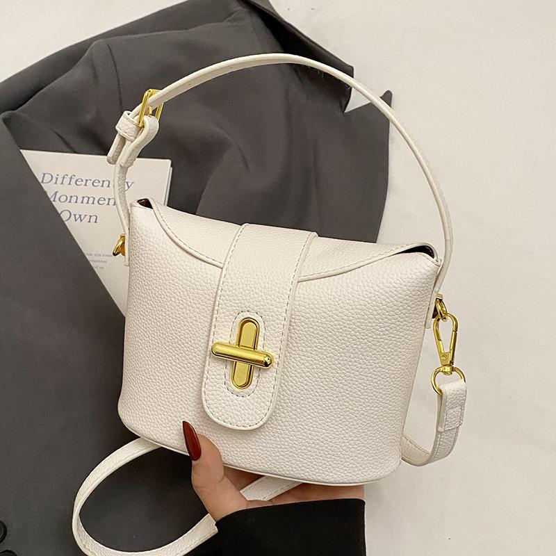 New Popular High-end Lychee Pattern Solid Color Portable Bucket Bag Fashionable Versatile Niche Commuter Style Messenger Women's Bag