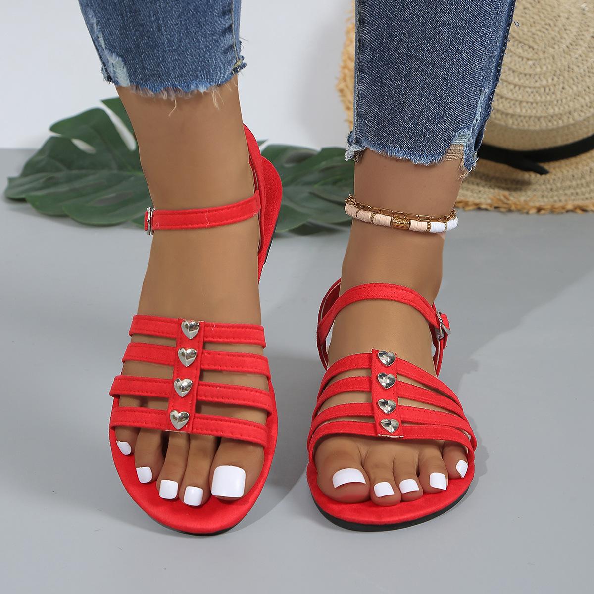

Большие размеры плоские сандалии женские лето 2025 новые стильные открытые носки один ремешок заклепки повседневные шлепанцы 36 красный