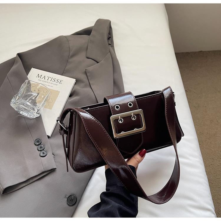 

Sweet and cool hot girl style armpit bag women s 2025 new French light luxury niche shoulder bag fashionable commuter handbag темно-коричневого