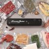 Vakuumverpackungsmaschine, Haushalts-Lebensmittel-Automatische Vakuumversiegelungsmaschine, Kleine Kunststoffversiegelungsmaschine, Mechanische Versiegelungs- und Konservierungsmaschine