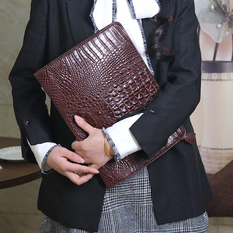 leather suit bolsa