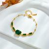 Gold Plated Adjustable Bracelet with Oval and Baguette Cut Green Stones Fashion Jewelry for Women