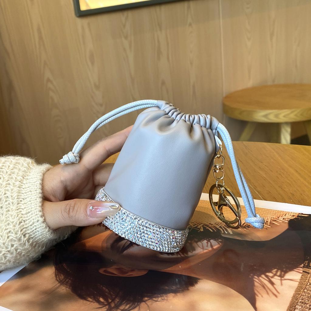Japanese simple portable drawstring bucket bag women's lightweight portable bucket bag casual nylon change bag small bag pendant