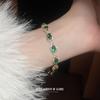 Emerald Green Vintage-Style Rhinestone Oval Bracelet: Luxurious, Versatile Hand Jewelry for Elegant Women