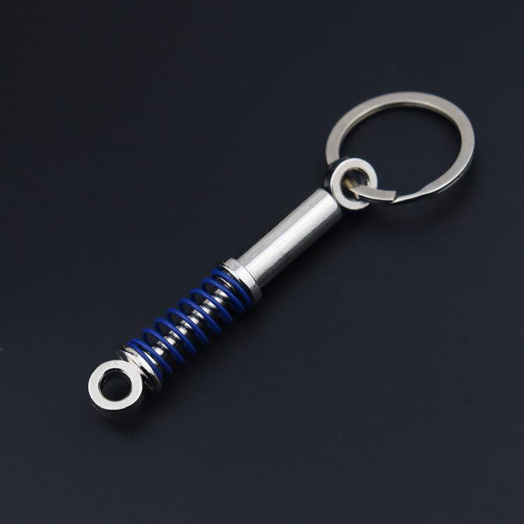 Porte-clés de voiture créatif avec levier de vitesse de turbine, moyeu de roue, disque de frein et pendentif amortisseur