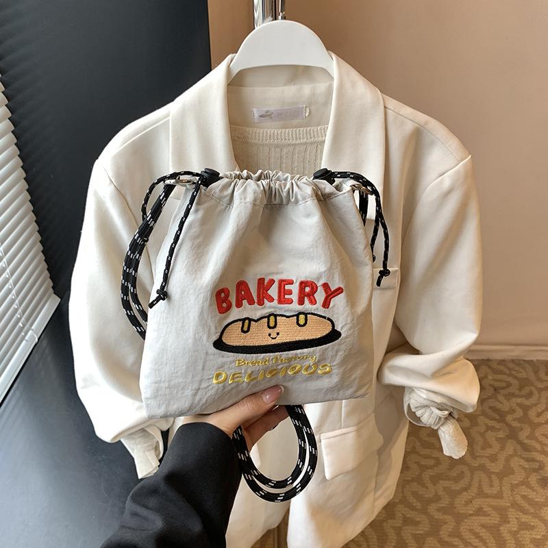 New nylon embroidered mobile phone bag fashionable versatile messenger bag simple drawstring canvas shoulder bag