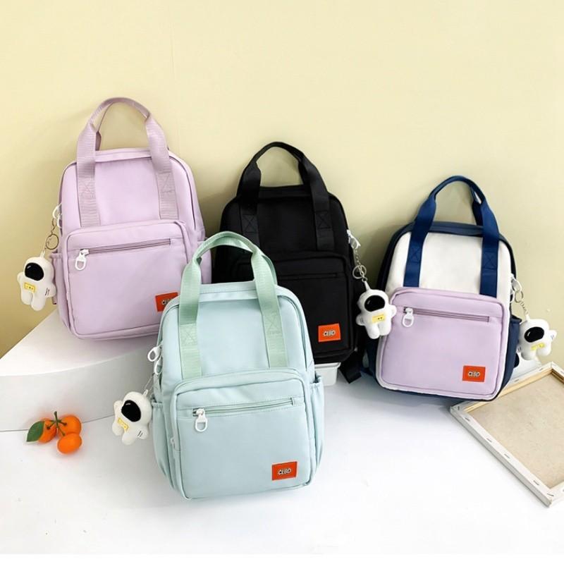 Unisex Primary School Student Backpack Waterproof Handbag With Colorful Patchwork Design