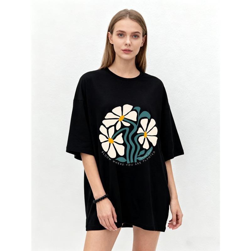 

Футболка оверсайз черного цвета с принтом цветка маргаритки и текстом «Цвети там, где посажен» для повседневной носки XXXXL чёрный