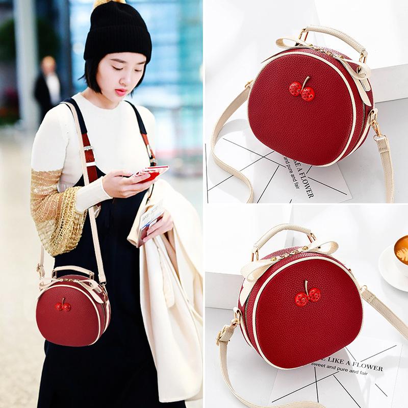 High-value bag women's 2025 new simple and high-end small round bag shoulder messenger bag fashionable portable women's bag tide